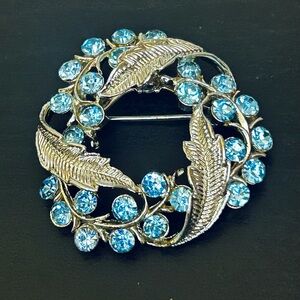 Elegant Silver and Blue Brooch
